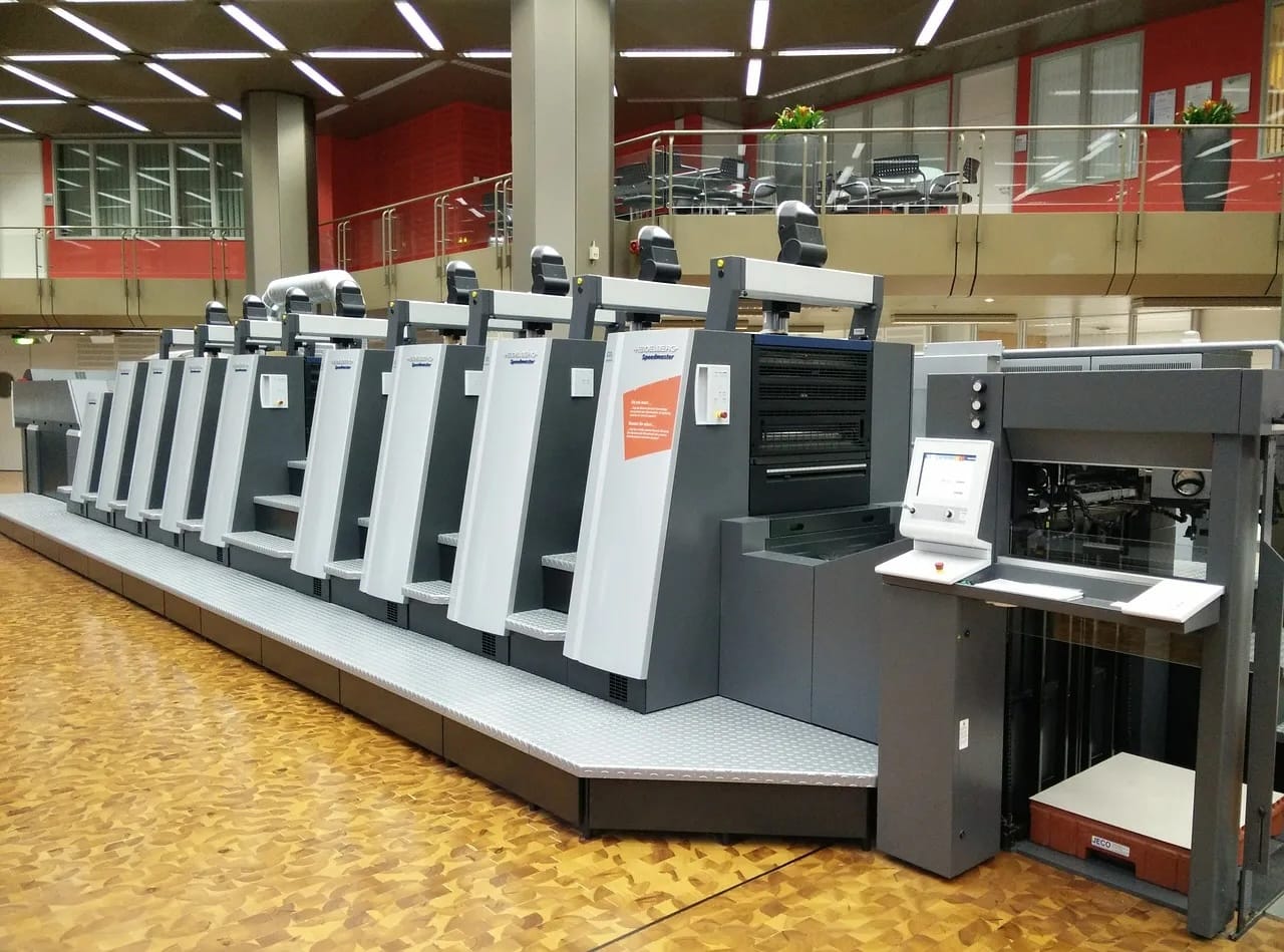 A row of print-on-demand printers for books