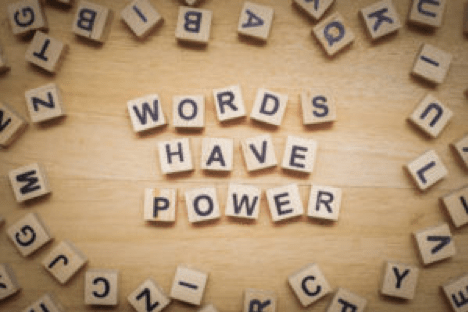 Scrabble letters spell 'Words Have Power'