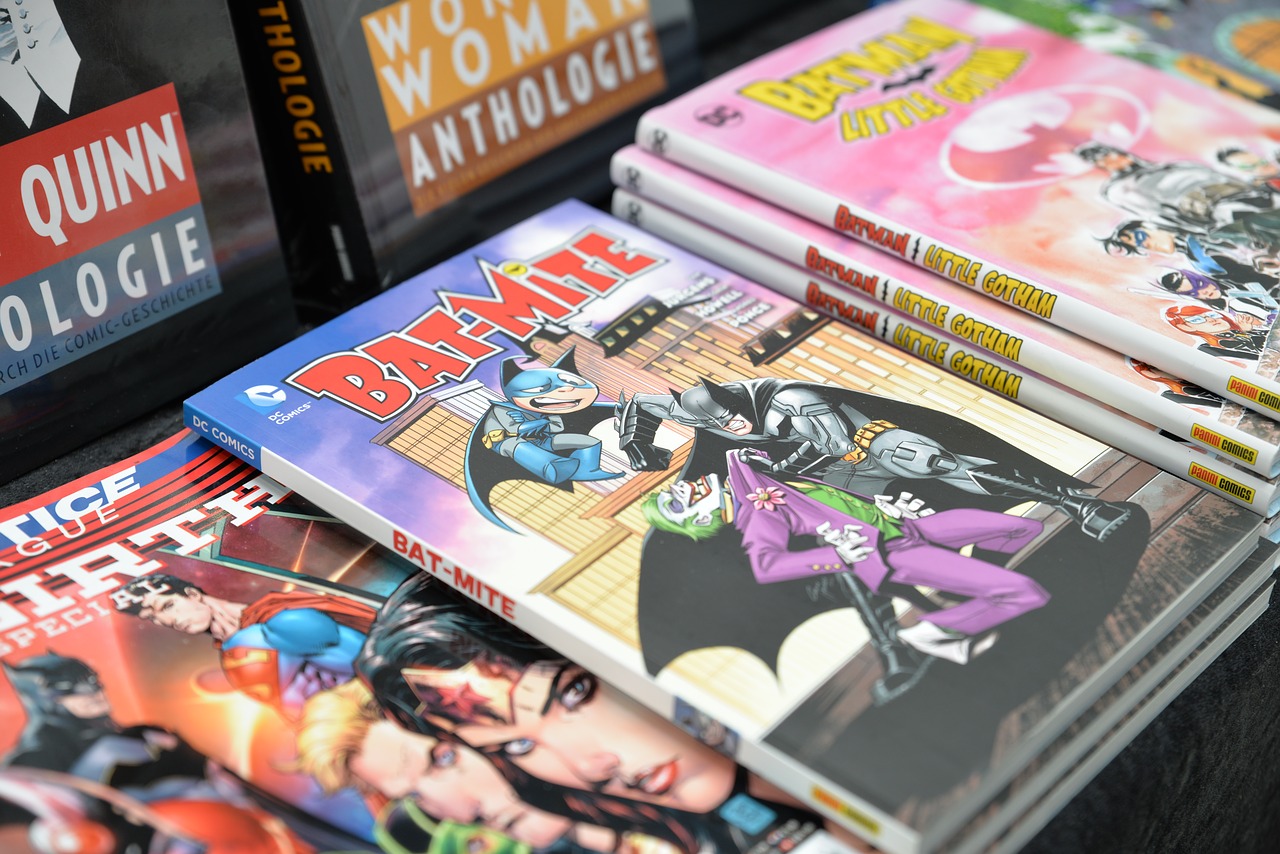 A Stack of graphic novels from Pixabay - https://pixabay.com/photos/batman-comic-con-comics-books-2216148/